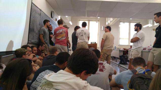 Students from MSU are seen barricaded in a classroom after there were reports of a gunman on campus.