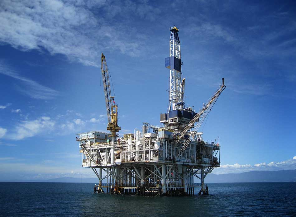 Large Pacific Ocean oil rig drilling platform off the southern coast of California.