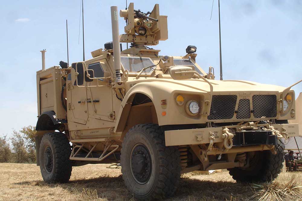 OSHKOSH, WI - JULY 27: The front grill of an Oshkosh Corp Humvee vehicle as used in the military on display the 2012 AirVenture at EAA on July 27 in Oshkosh, Wisconsin.