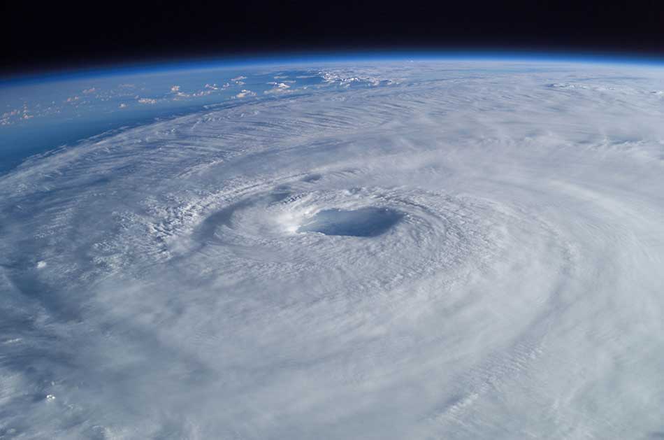 Hurricane Isabel (2003) as seen from orbit during Expedition 7 of the International Space Station. The eye, eyewall, and surrounding rainbands, characteristics of tropical cyclones, are clearly visible in this view from space. Credit: Wikipedia