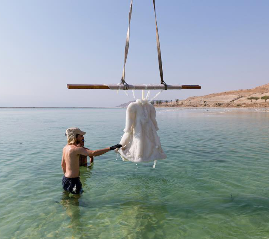 Artist submerges death robe at the Dead Sea
