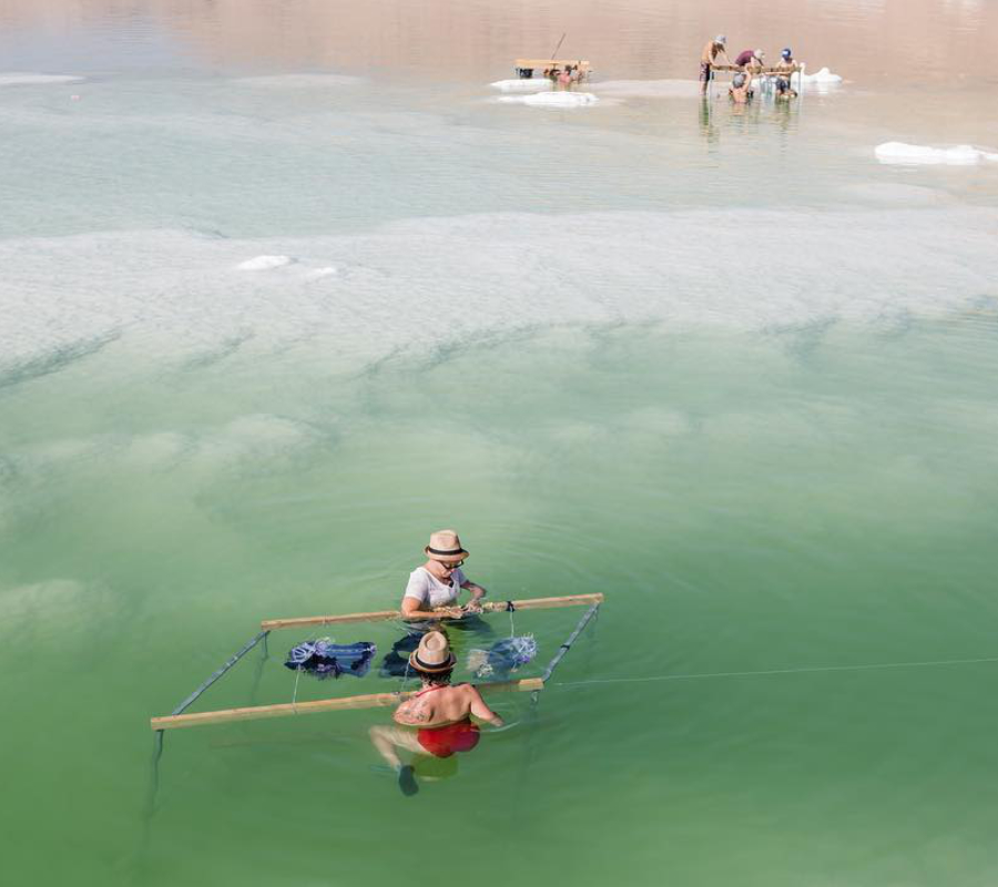 Artist submerges death robe at the Dead Sea