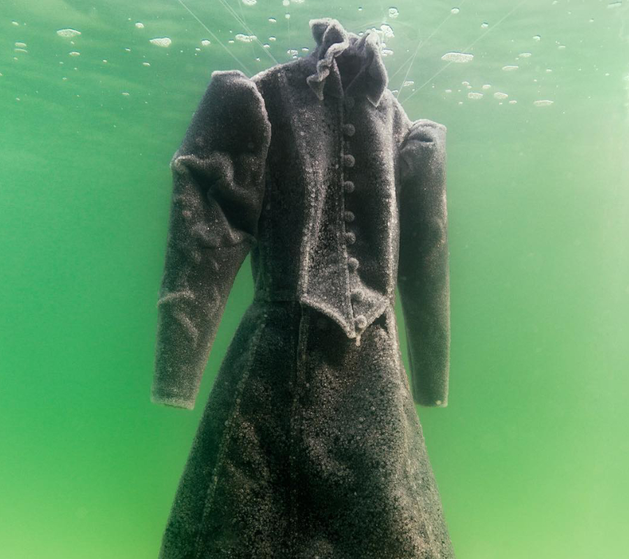 Artist submerges death robe at the Dead Sea