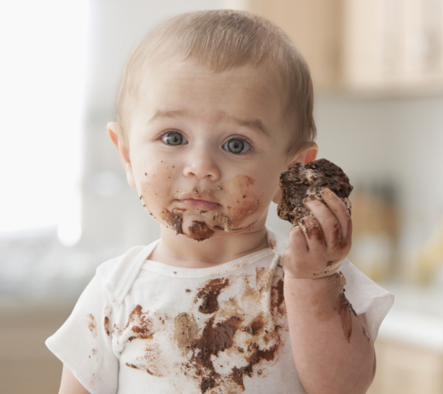 Baby eating chocolate