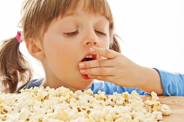 Girl Eating Popcorn