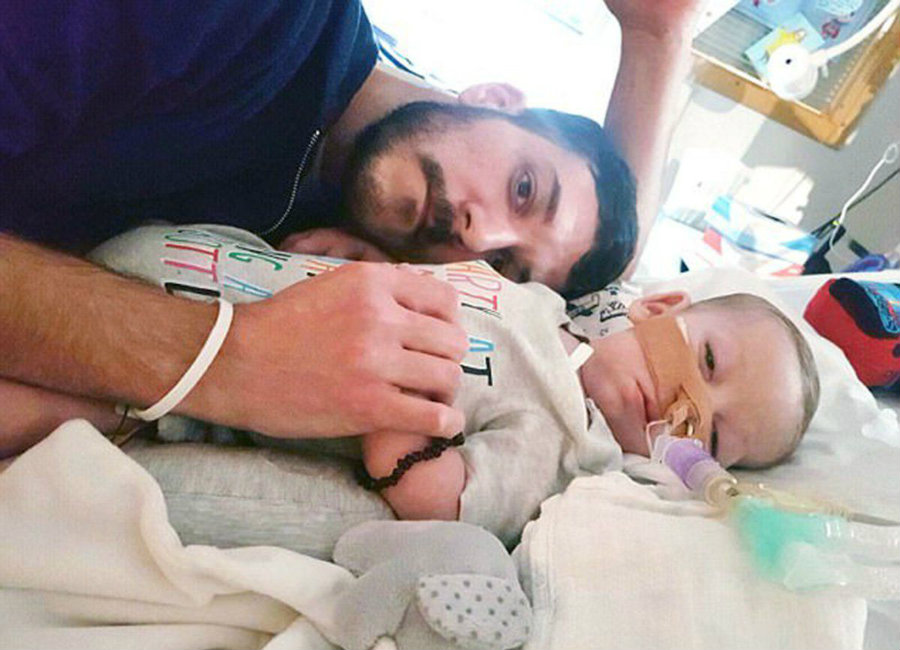 Charlie and his father, Chris. Image credit: Featureworld / Metro