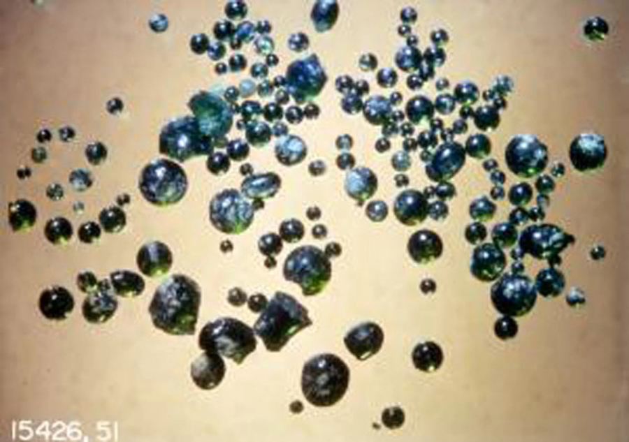 Volcanic crystal beads recovered by the Apollo 15 mission. By analyzing them, researchers believe water has been a part of the Moon since its early existence. Credit: NASA