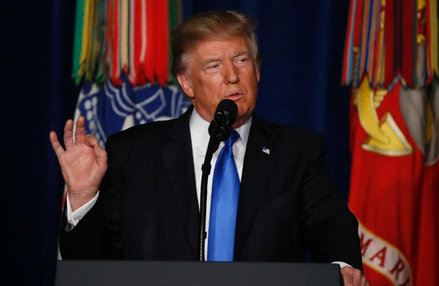Trump addressing the nation from Fort Myer, Va. on Monday. Image Credit: Joshua Roberts / Reuters