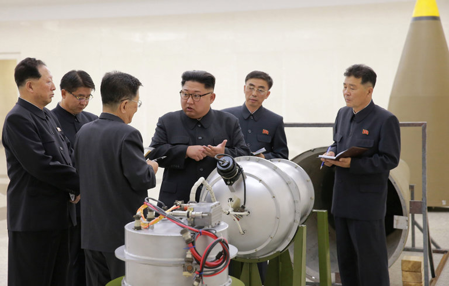 Kim Jong-un, inspecting a missile-ready hydrogen bomb. Image Credit Korea Central News Agency