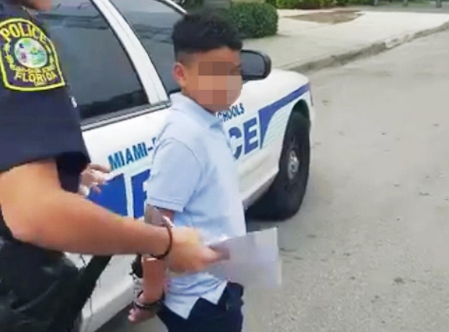 7-year-old handcuffed out of his school, 7-year-old detained in Miami, Teacher filing charges against 7-year-old student